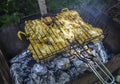 Closeup of Ã±harcoal outdoor barbecue, chicken on the grill with flames Royalty Free Stock Photo