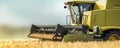 Closeup Of Harvester Pouring Freshly Harvested Crops