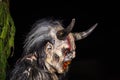 Closeup of head of horned devil in traditional krampuslauf with wooden masks in Retz, Austria Royalty Free Stock Photo