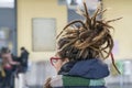 Closeup head of a woman has Rastafarian hairstyle