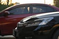 Closeup headlight led of black modern car in the morning Royalty Free Stock Photo