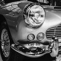 Closeup of the headlights and front bumper on vintage automobile Royalty Free Stock Photo