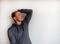 Closeup headshot portrait petrified young handsome man looking shocked surprised in disbelief, open mouth eyes, jaw dropped, Royalty Free Stock Photo