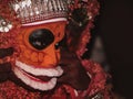 a closeup headshot portrait of a theyyam artist