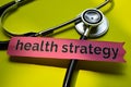 Closeup health strategy with stethoscope concept inspiration on yellow background