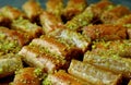 Closeup Heap of Baklava Pastries Topped with Chopped Pistachio Nuts Royalty Free Stock Photo