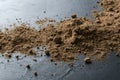 Closeup of heap of cococa powder on the dark surface Royalty Free Stock Photo