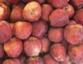 Closeup heap sweet fresh ripe red apples. Fruit backround. Healthy food. Fall harvest.