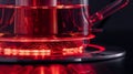 A closeup of the heating element on an electric kettle glowing red as it rapidly heats up the water inside Royalty Free Stock Photo