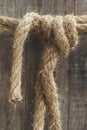 Closeup of Hemp Rope Fastened on Wooden Column Royalty Free Stock Photo
