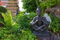 Hermit statue performing Thai yoga