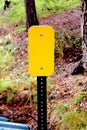 Closeup High Angle View of Blank Caution Signs along Iron Mountain Road
