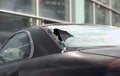 Closeup of hole in rear window of car Royalty Free Stock Photo