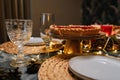 Closeup of holiday dinner table is served dishes, cutlery, candles. Celebration birthday, wedding, Christmas in modern Royalty Free Stock Photo