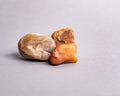Closeup of holistic stones isolated in gray background Royalty Free Stock Photo