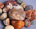 Closeup of holistic stones isolated in gray background Royalty Free Stock Photo