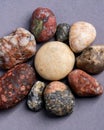 Closeup of holistic stones isolated in gray background Royalty Free Stock Photo