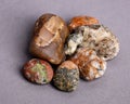 Closeup of holistic stones isolated in gray background Royalty Free Stock Photo