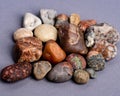 Closeup of holistic stones isolated in gray background Royalty Free Stock Photo