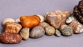 Closeup of holistic stones isolated in gray background Royalty Free Stock Photo