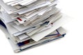 Closeup of home mails pile on white