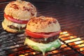 Closeup of Homemade Burgers On Hot BBQ Grill