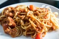 Closeup homemade spagetti with italian red sauce on plate