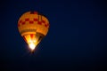 Closeup a hot air balloon flight in the night time