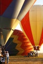 Closeup of hot air balloons being prepared for flight