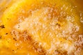 Closeup of hot bubbling boiling oil in a deep fryer Royalty Free Stock Photo