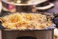 Closeup of hot bubbling boiling oil for frying background, thai street food market