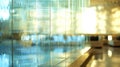 A closeup of a hotel lobby with an expansive wall of smart glass panels. The panels are in clearest state providing a Royalty Free Stock Photo