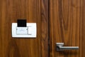 Closeup of hotel room door and lights switch. Key card in electronic lock Royalty Free Stock Photo