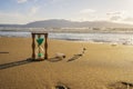 Closeup of hourglass on the sand.Timer Beach Sunset Royalty Free Stock Photo