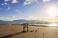 Closeup of hourglass on the sand.Timer Beach Sunset Royalty Free Stock Photo