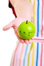 Closeup housewife or chef in kitchen apron using apple timer Royalty Free Stock Photo