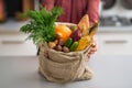 Closeup on housewife showing fresh vegetables Royalty Free Stock Photo