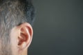 closeup of human ear on black background Royalty Free Stock Photo