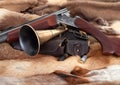 Closeup of hunter gun on fur background Royalty Free Stock Photo