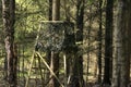 Closeup hunting chair up a tree in a Danish forest Royalty Free Stock Photo