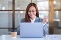 A beautiful businesswoman using laptop computer for working online and video conference Royalty Free Stock Photo