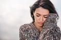 Closeup image of beautiful dreamy female posing against lake with blowing hair. Portrait of romantic female closed eyes enjoying Royalty Free Stock Photo