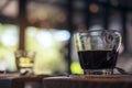 Closeup image of cups of hot coffee and tea on vintage wooden table in cafe Royalty Free Stock Photo