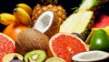 Closeup photo cut of kiwi, pineapple, orange, grapefruit, banana, coconut, avocado and lime. Exotic tropical fruits Royalty Free Stock Photo
