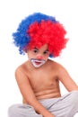 Closeup image of the cute little clown boy