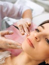 Closeup image of dermatologist& x27;s hands doing electro-epilation. The process of electrolysis on the face. Beauty