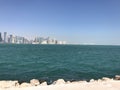 Closeup image of the Doha coastline overlooking the city skyline