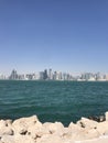 Closeup image of the Doha coastline overlooking the city skyline