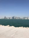 Closeup image of the Doha coastline overlooking the city skyline