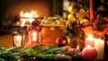 Closeup image of golden gift box, candles and lanterns against Christmas tree and fireplace Royalty Free Stock Photo